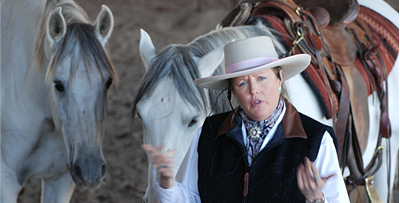 Natural Horsemanship clinician Karen Scholl educates audience at horse expo