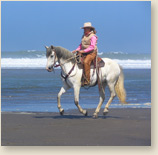 Riding on the beach